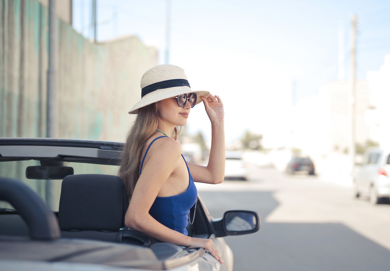 stylish female on a convertible